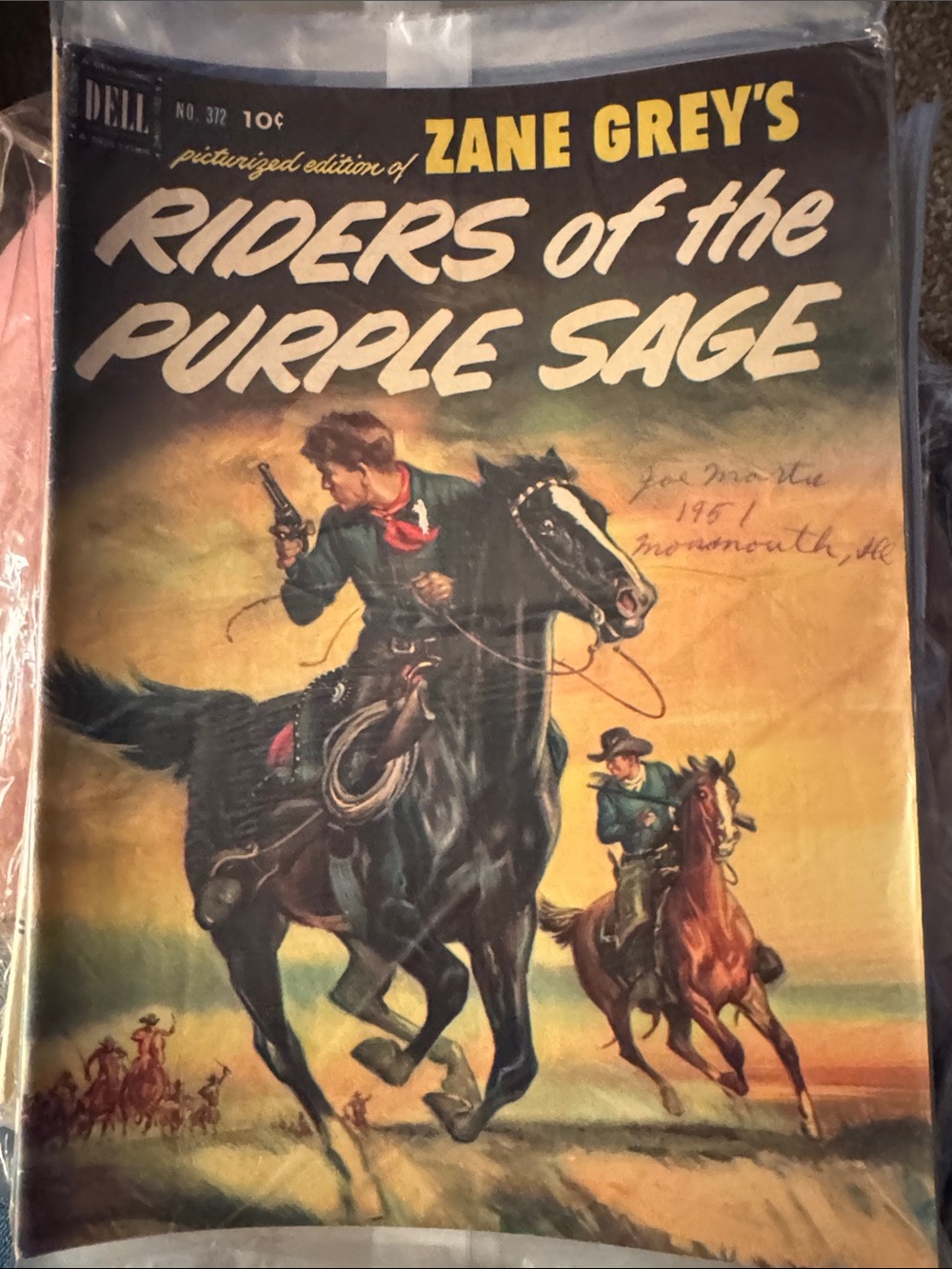 Dell Riders of the Purple Sage Comic Cover – Black, Brown, Yellow